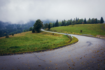 Curved road on Mountain pass called Puchaczowka between Krowiarki and Snieznik Mountains in...