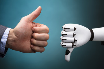 Businessperson And Robot Showing Thumb Up And Thumb Down Sign