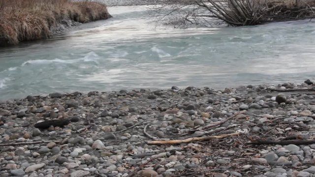 Whirl on fast mountain river
