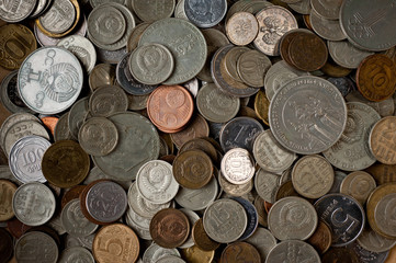 A large pile of different Russian coins and coins of other countries