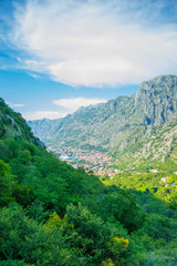 Fototapeta premium A view of the ancient city of Kotor and the Boka Kotorska bay from the top of the mountain.
