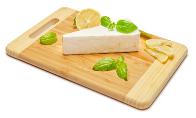 brie or camambert cheese on white background
