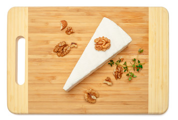 brie or camambert cheese on white background
