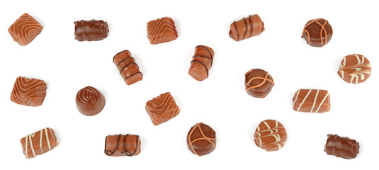 Fototapeta na wymiar Top view of various chocolate pralines isolated on white background.