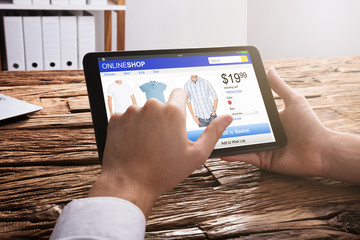 Businessperson Shopping Online On Digital Tablet