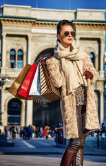 Fototapeta na wymiar modern tourist woman in Milan, Italy looking into distance