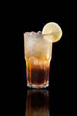 Long island ice tea on a black background with reflection