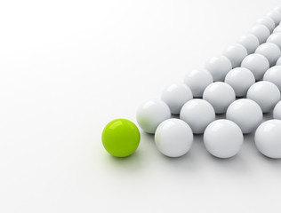 Green ball ahead of white balls. Conception of leadership. 3d render