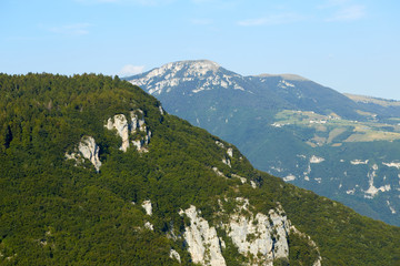 Fototapeta na wymiar Monte Baldo. Italy. Peaks of mountains in a blue haze.