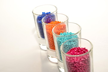 plastic granules in glasses