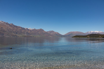 New Zealand Queenstown Lake Wakatipu landscape mountain fjord crystal clear water