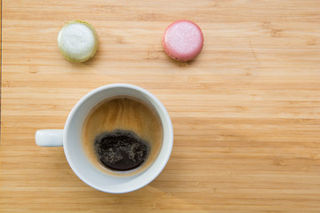Happy food face from coffee and macaroon
