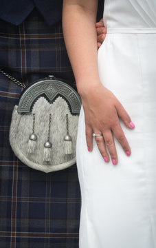 Closeup Of Scottish Bride And Groom Wearing A Kilt At Wedding