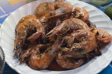 Shrimp burnt on white plate