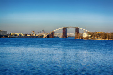 The view from Postal Square to new bridge construction on the Dnieper river, Kiev, Ukraine