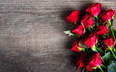 Foto auf Acrylglas Red roses on a table © Olena Rudo