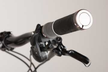 Bike grip of mountain bike, close up view, studio photo.