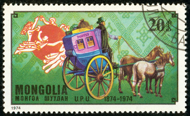 Ukraine - circa 2018: A postage stamp printed in Mongolia show French post coach. Series: U.P.U....