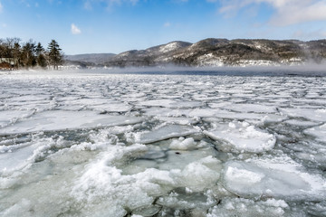 Ice formation on the lake with mountain