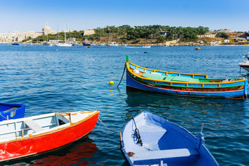 Traditional boats at Marsaxlokk Harbor in Malta