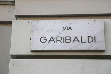 Road sign with the name GARIBALDI is a street in Italian City