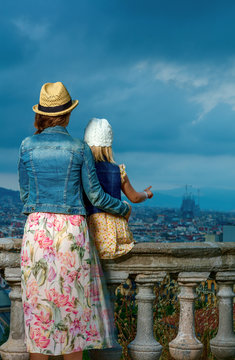 mother and daughter tourists in Barcelona, Spain enjoying view