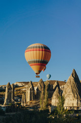 Fototapeta na wymiar Hot air balloons festival in Goreme national park, fairy chimneys, Cappadocia, Turkey