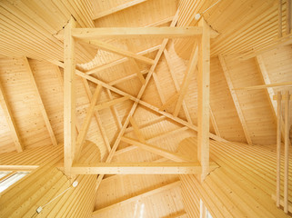 Ceiling with geometric pattern of wooden beams