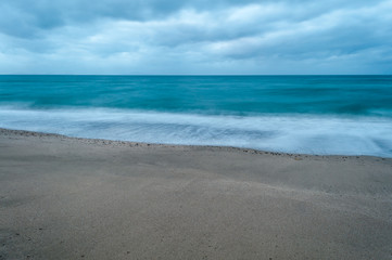 Fototapeta na wymiar Long exposure of beach in winter