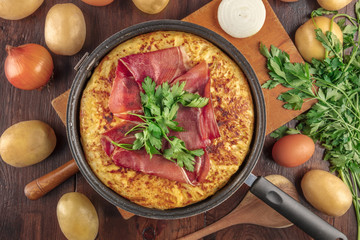 Spanish tortilla, shot from above with ingredients