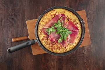 Overhead photo of Spanish tortilla with copy space