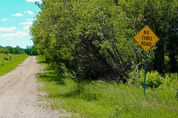 A No Thru Road sign in the country