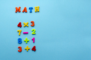 mathematical actions on blue paper background