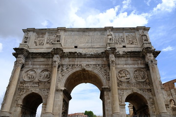 Fototapeta na wymiar Triumphal Arch of Constantine. Constructed in the period 312 and 315 AD, the arch lies between the coliseum and the Palatine Hill