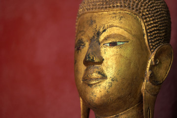 Buddha statue in Wat Xieng Thong (Golden Temple) in Luang Prabang , Laos.