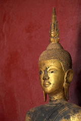 Buddha statues in Wat Xieng Thong (Golden Temple) in Luang Prabang , Laos. The temple is open to...