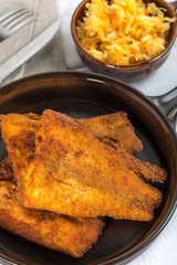 Pieces of cod in breadcrumbs.