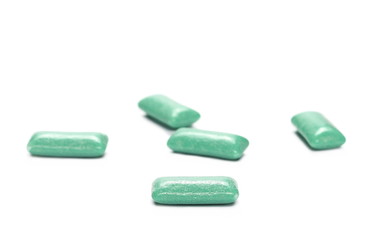 green chewing gum isolated on white