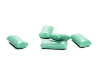 green chewing gum isolated on white