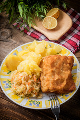 Fried cod fillet served.