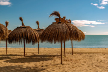 Straw beach umbrellas