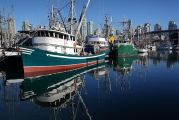 False Creek Fishermen's Wharf. Fish boats at Vancouver’s Fishermen’s Wharf near Granville Island. British Columbia, Canada.

