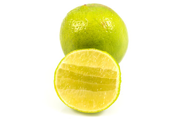 Lime with a half cut isolated on white background, with clipping path.
