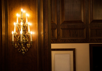 Light as many candles in the classic interior of the hotel