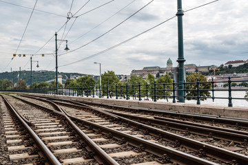 Railway tracks in riverbank of Danube river in Budapest.