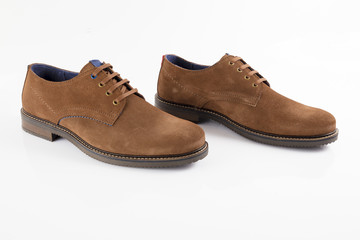 Male brown leather shoe on white background, isolated product, comfortable footwear.