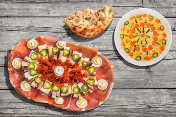 Traditional Serbian Welcome Appetizer Savory Dish Meze With Bowl Of Delicious Refreshing Olivier Salad And Leavened Pitta Flatbread Torn Loaf Set On Old Weathered Cracked Pinewood Picnic Table