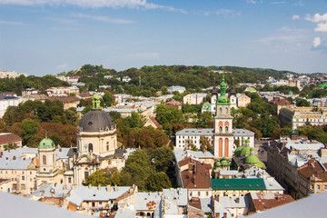 Fototapeta na wymiar View to the city of Lviv from Town Hall. Aerial view on the old centre of Lviv in Ukraine. Europe.