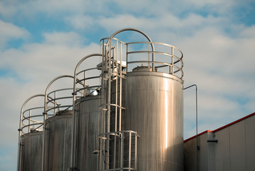 Metal tanks bulk silos industrial factory storage containers.Tanks for preparation of champagne....