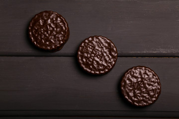 Chocolate chip cookies on a wooden background